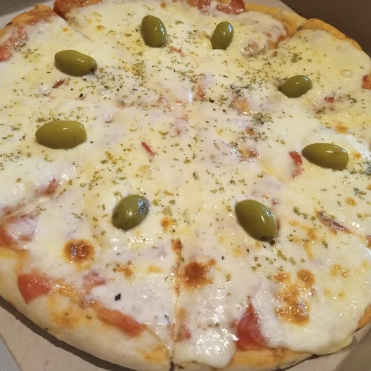 2 pizzas de  muzzarella clasicas